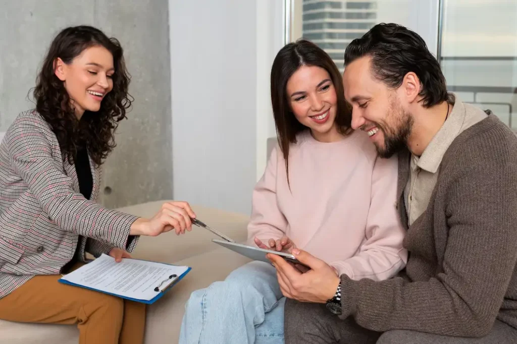 Couple consulting with family law attorney, reviewing documents and discussing legal matters in Grand Prairie regarding family law appeals.