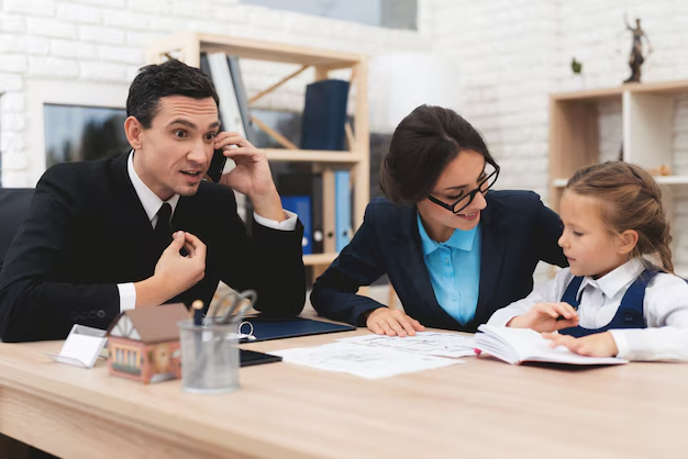Family law attorney consulting with a client and her child, discussing legal documents and options for family court appeals in a professional office setting.