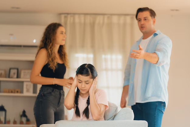 Family dispute scene with a distressed girl covering her ears, while a man gestures expressively and a woman stands nearby, illustrating family law issues relevant to custody and support cases.