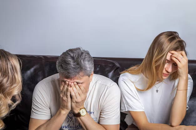Couple in distress during family law consultation, representing emotional challenges in custody and divorce cases at Randolph AFB.